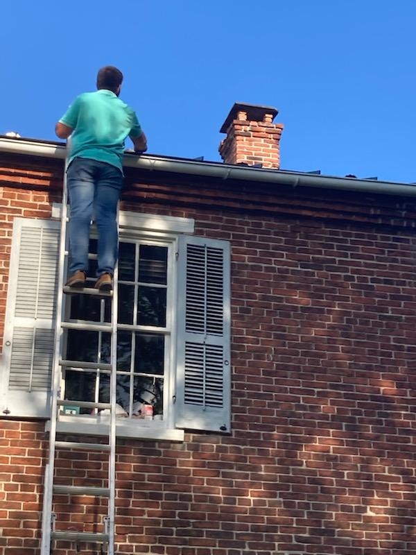 Kevin Smoker inspecting a roof